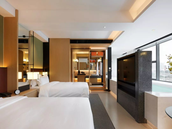 鄭州現(xiàn)代風(fēng)格精品酒店裝修設(shè)計(jì)公司案例(圖2) 鄭州現(xiàn)代風(fēng)格精品酒店裝修設(shè)計(jì)公司案例(圖2)