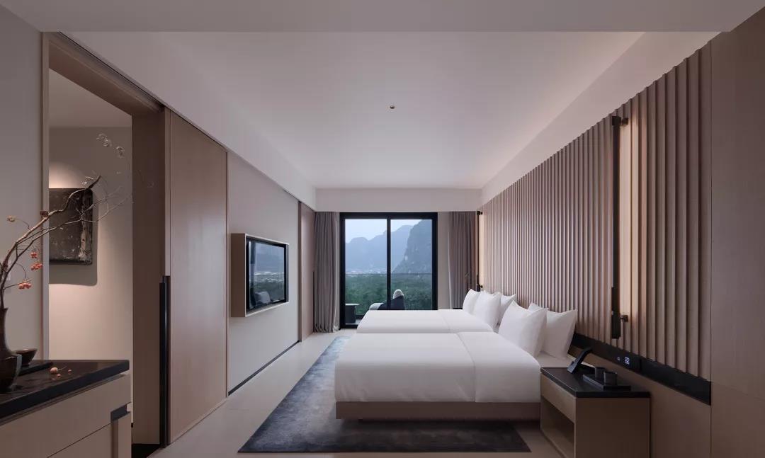 鄭州新中式酒店設(shè)計(jì)公司玖壤酒店裝修案例(圖20) 鄭州新中式酒店設(shè)計(jì)公司玖壤酒店裝修案例(圖20)