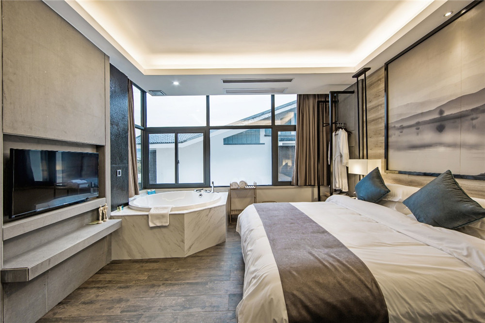 焦作九曲竹文化主題民宿酒店設(shè)計(jì)案例(圖6) 焦作九曲竹文化主題民宿酒店客房裝修設(shè)計(jì)實(shí)景圖