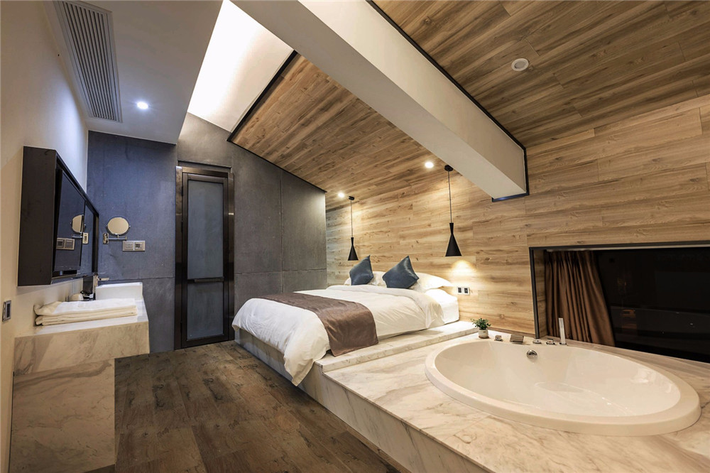 焦作九曲竹文化主題民宿酒店設(shè)計(jì)案例(圖8) 焦作九曲竹文化主題民宿酒店客房裝修設(shè)計(jì)實(shí)景圖